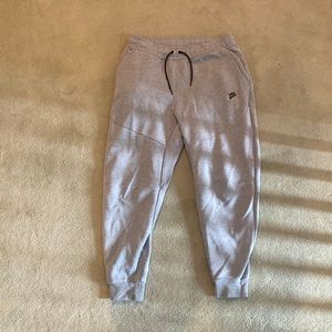 Grey size medium Nike sweatpants.